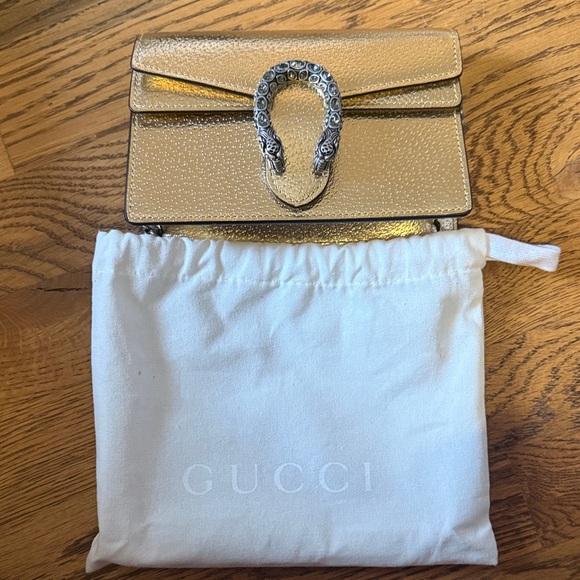 Gucci Handbags - Gucci Gold Mini Dionysus Clutch with Chain Detail